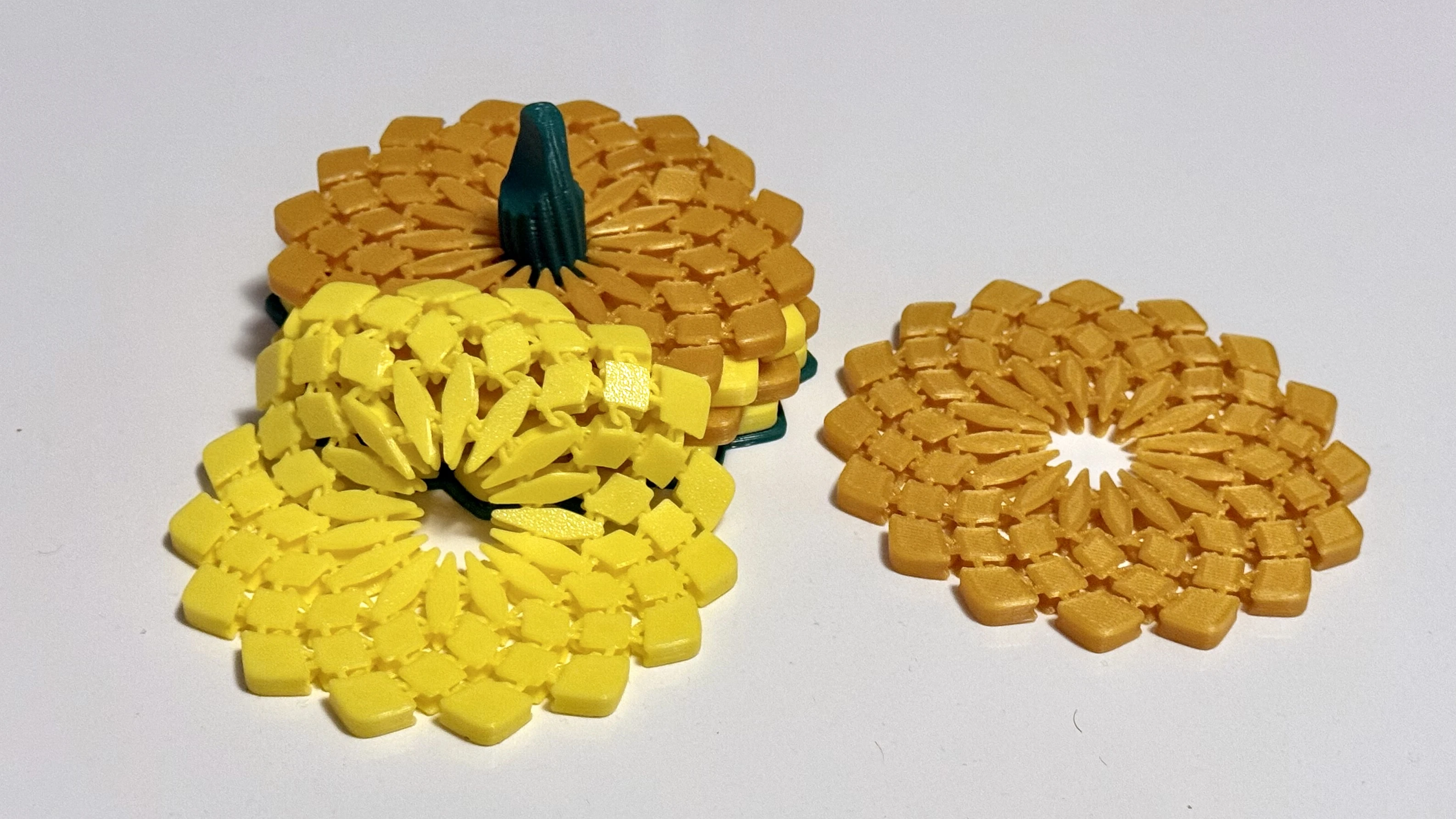 3D Printed coasters in the shape of a sunflower